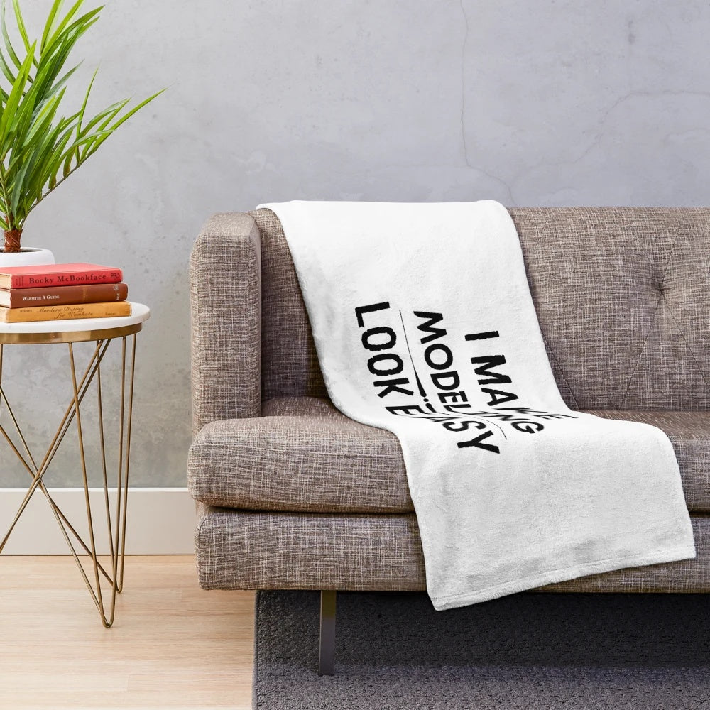 Plush blanket with text "I Make Modeling Look Easy