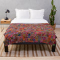 Mola plush blanket with vibrant Panama art design