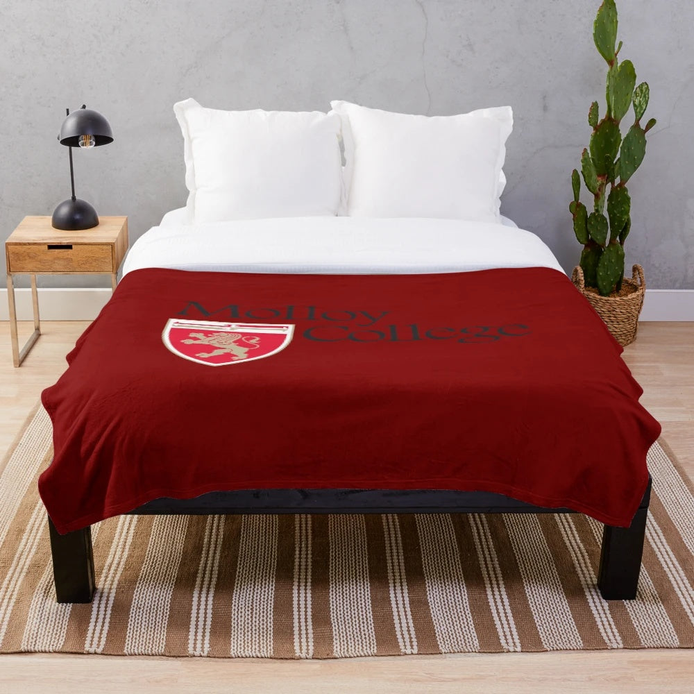Molloy College plush blanket with mascot logo