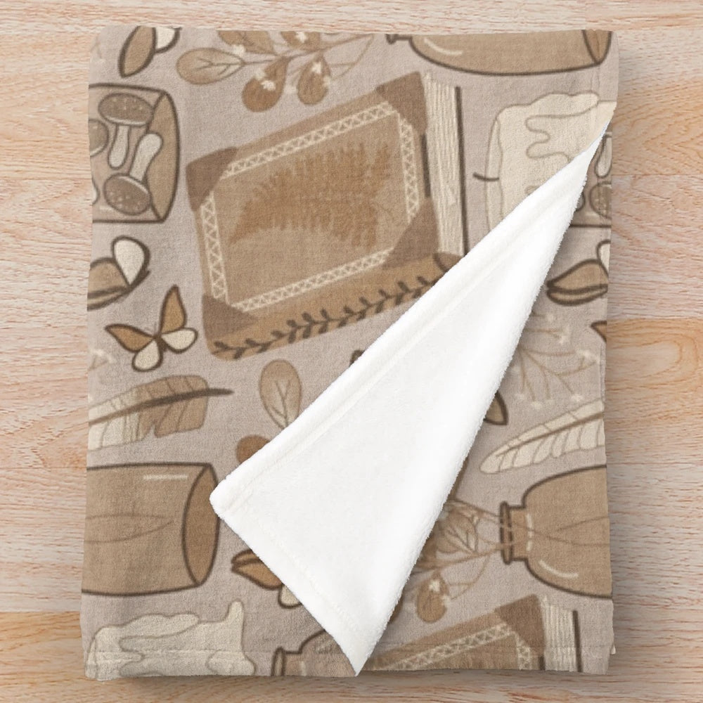 Cozy cottage core plush blanket with textured monochrome design and nature-inspired elements