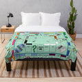Soft and cozy plush blanket with a Monopoly-inspired board game design