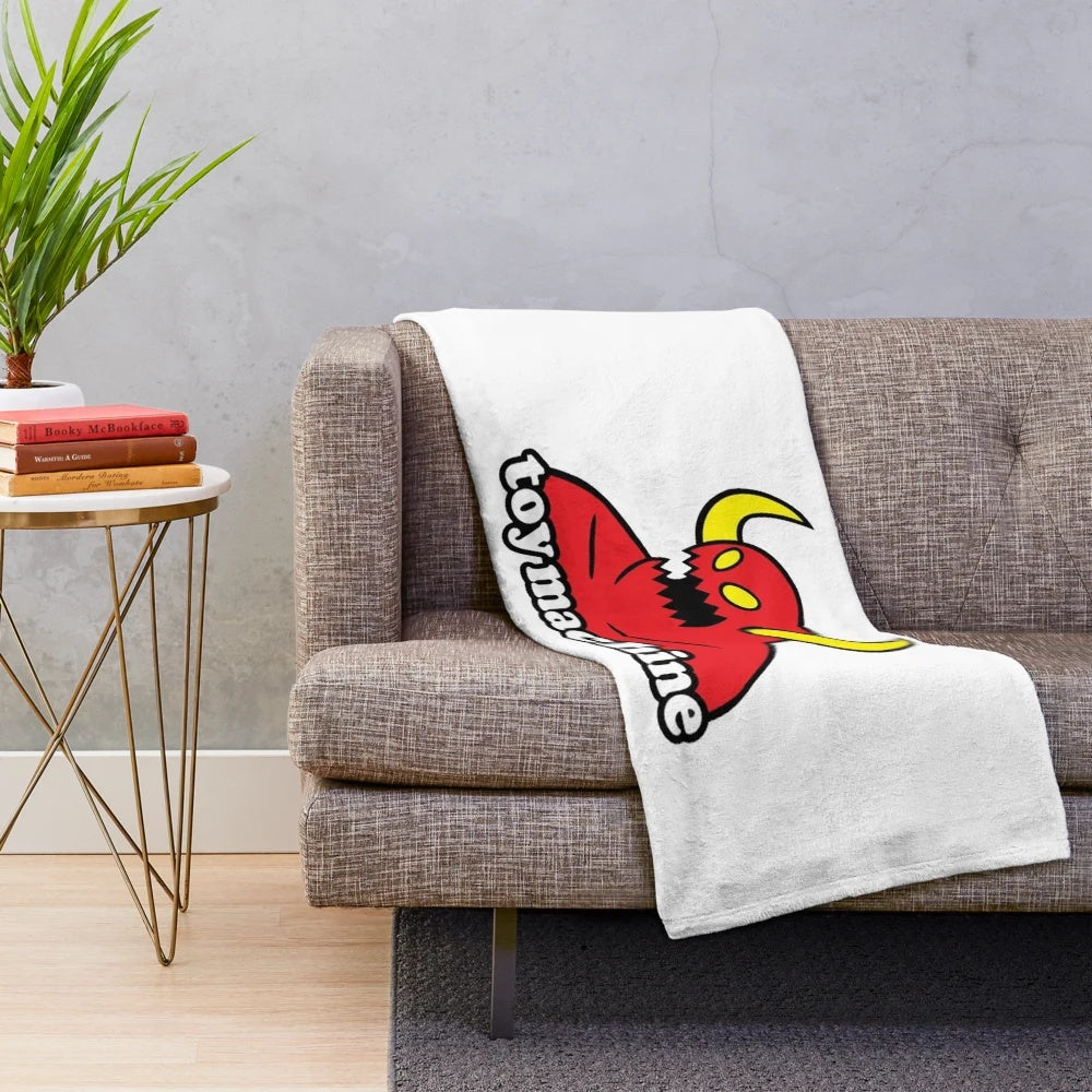 Monster machine plush blanket with wheels and skateboard design