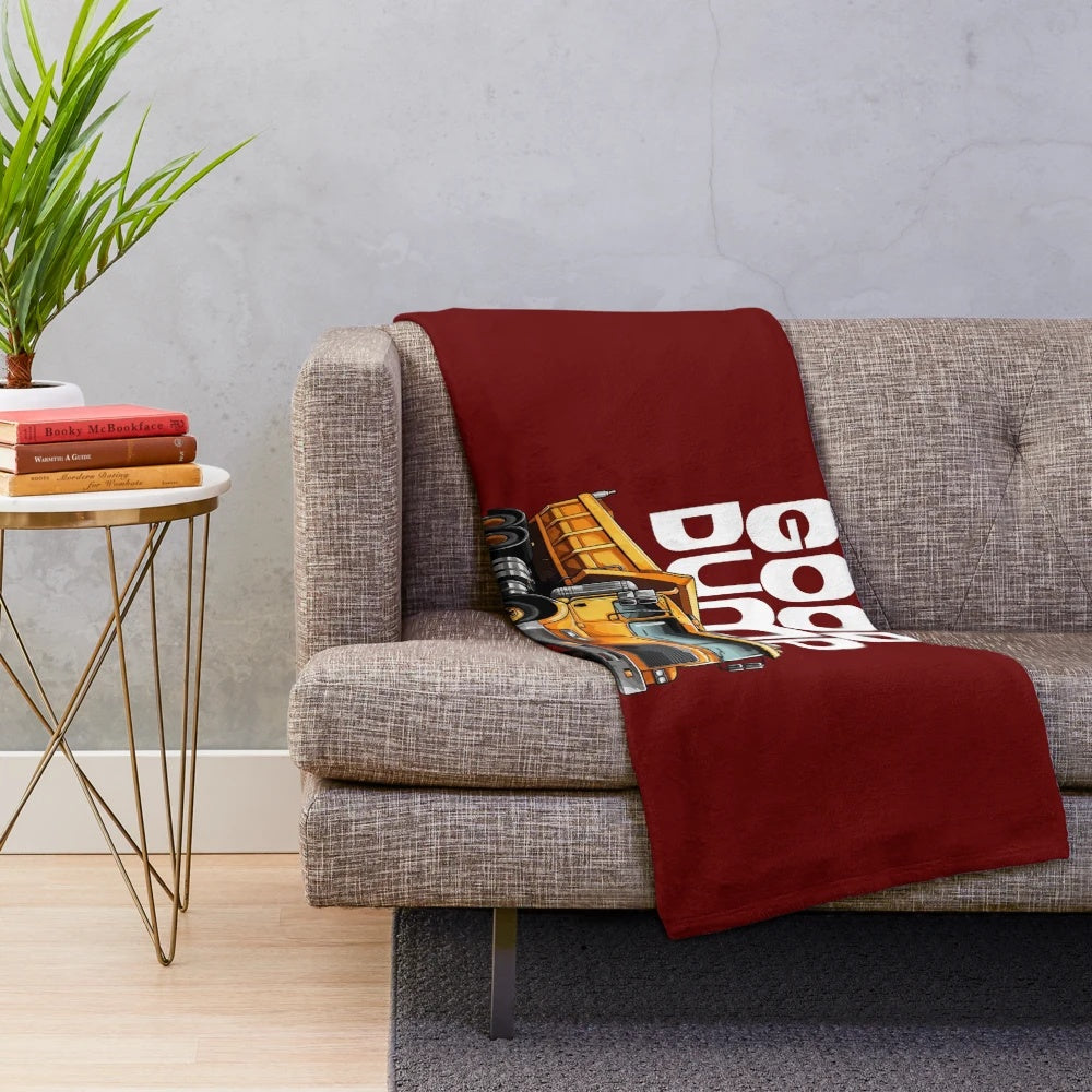 Soft and plush monster truck-themed blanket for cozy comfort