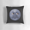 Soft and plush moon emoji pillow in a black and white cosmic design
