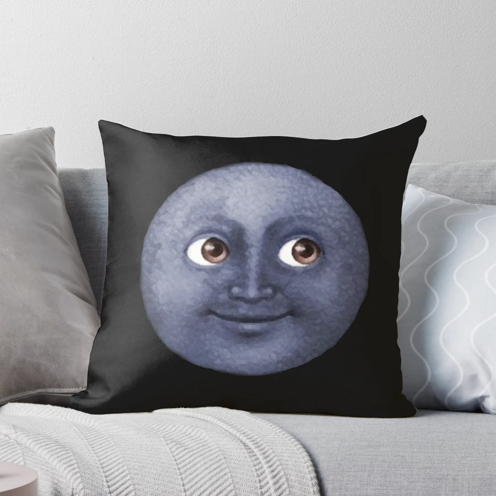 Soft and plush moon emoji pillow in a black and white cosmic design