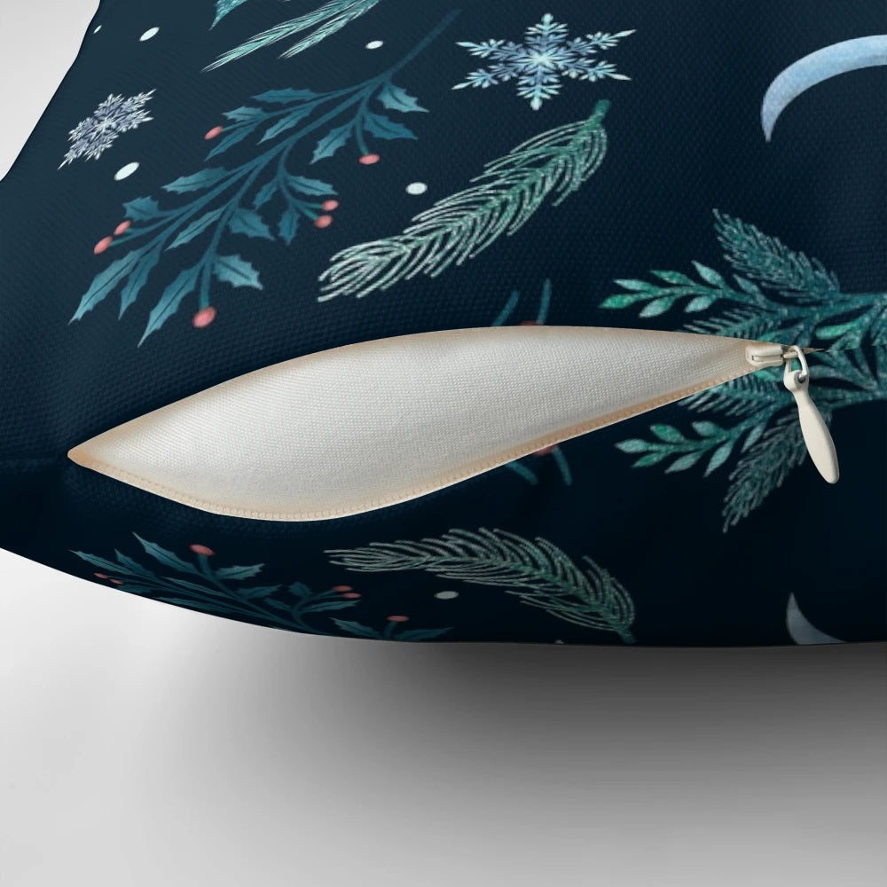 Teal and mint green pillow with a moonlit winter garden scene, featuring snowflakes and a full moon