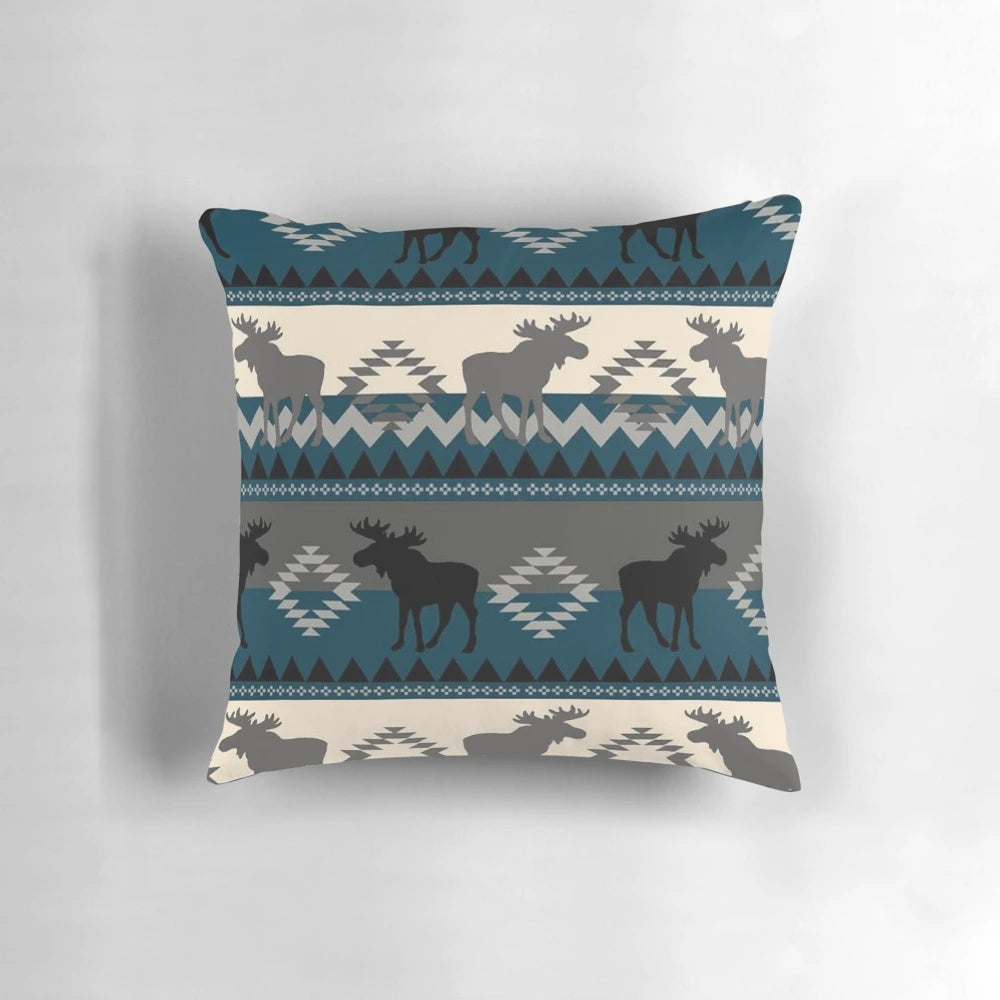 A soft, plush pillow featuring a majestic moose design in a southwest-inspired pattern.