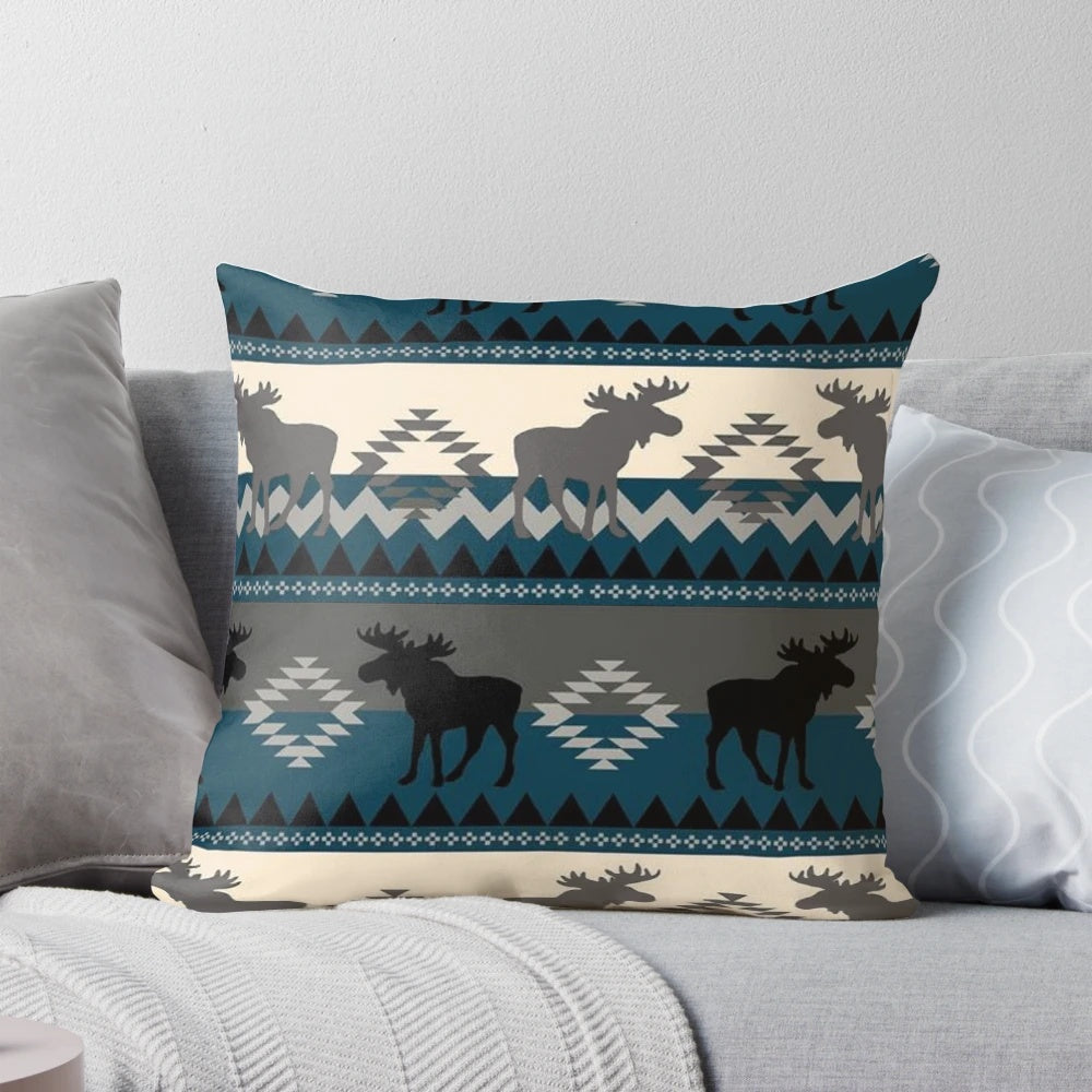 A soft, plush pillow featuring a majestic moose design in a southwest-inspired pattern.