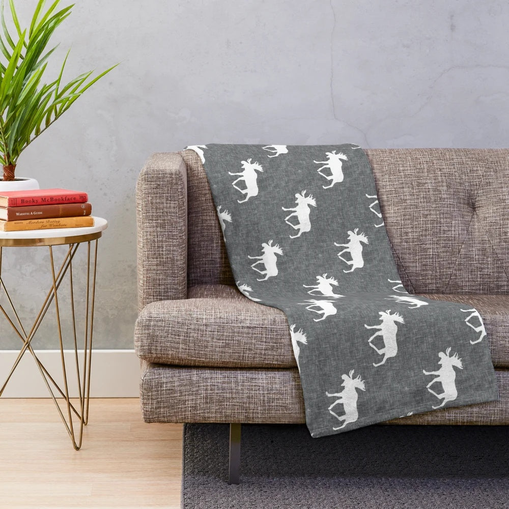 Soft and plush moose-printed grey blanket for a woodland-inspired nursery
