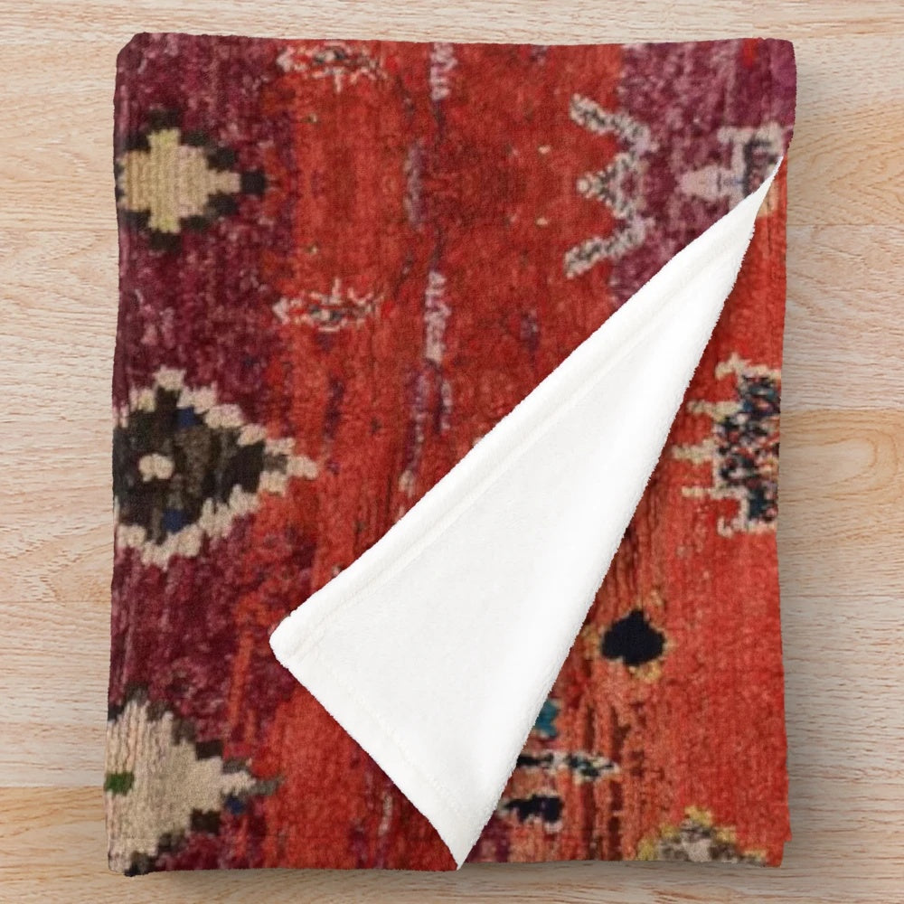 Vibrant Moroccan-style plush blanket with abstract pattern