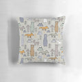 Colorful mountain scene with cute forest animals like bears, moose, and foxes on a plush pillow