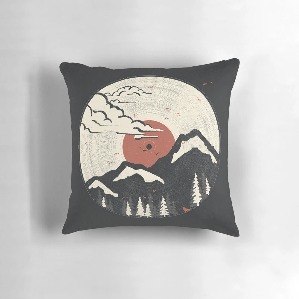 Cozy mountain-themed pillow with nature and wildlife imagery