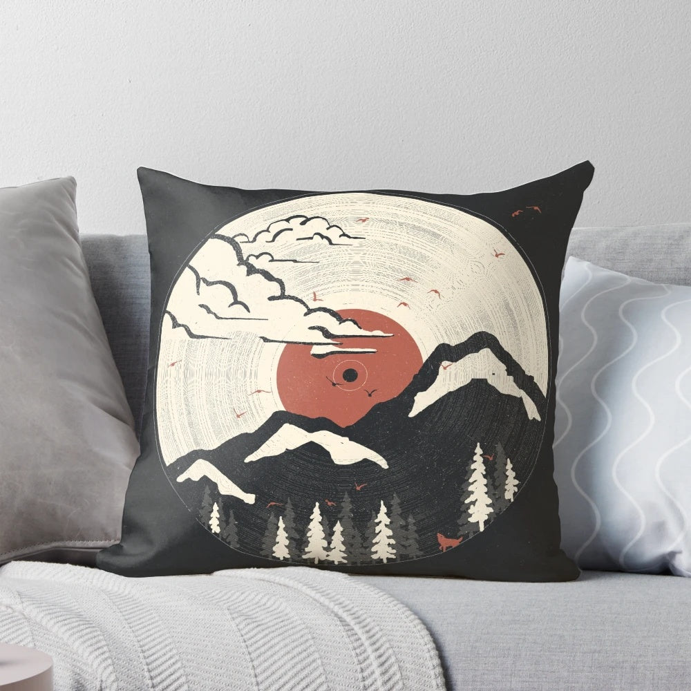 Cozy mountain-themed pillow with nature and wildlife imagery