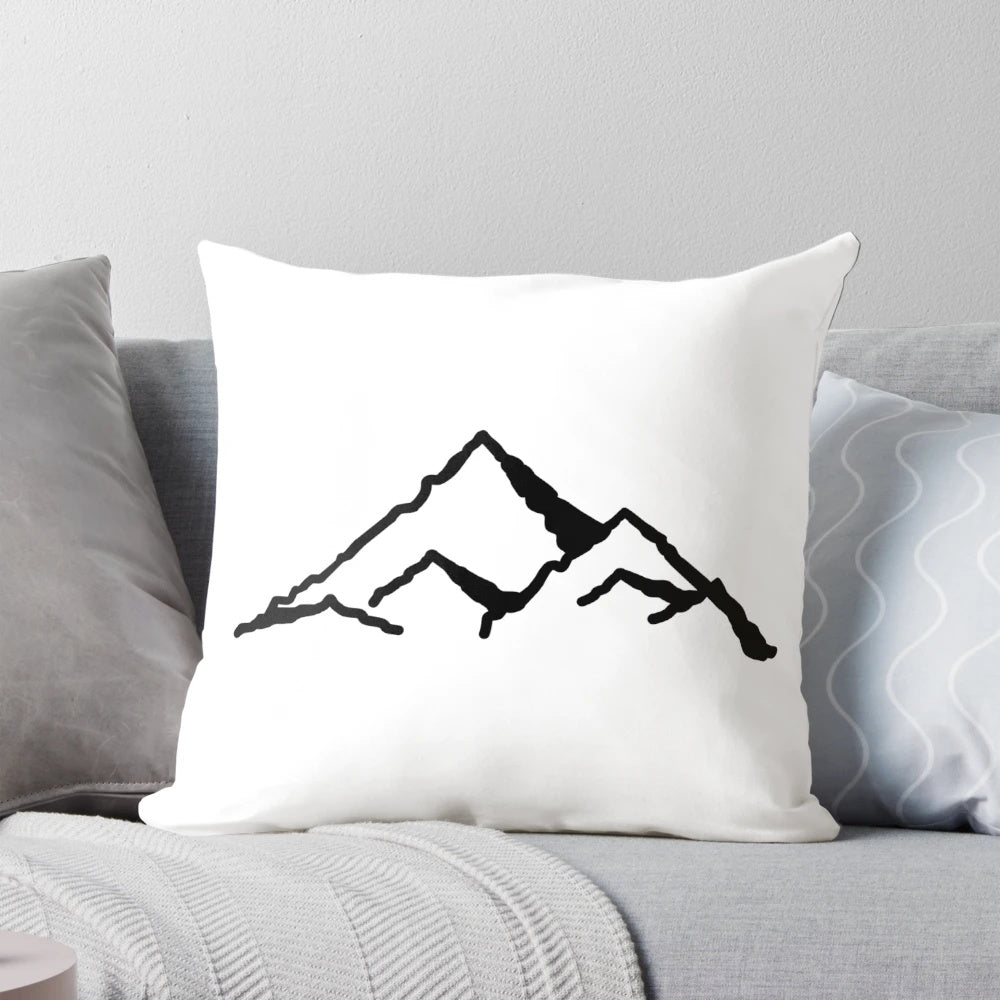 Soft, plush mountains pillow featuring snowy peak design for outdoor enthusiasts