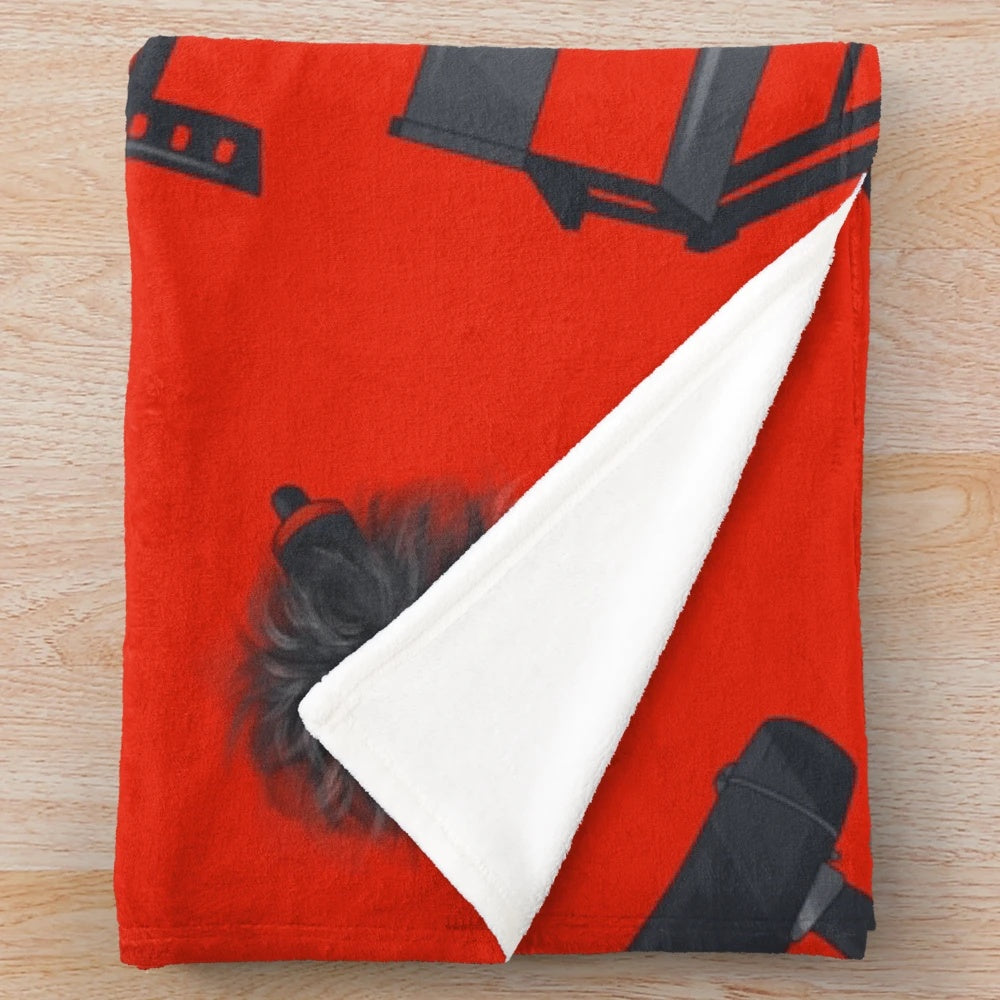 Plush movie lover blanket with cinema and film-themed pattern