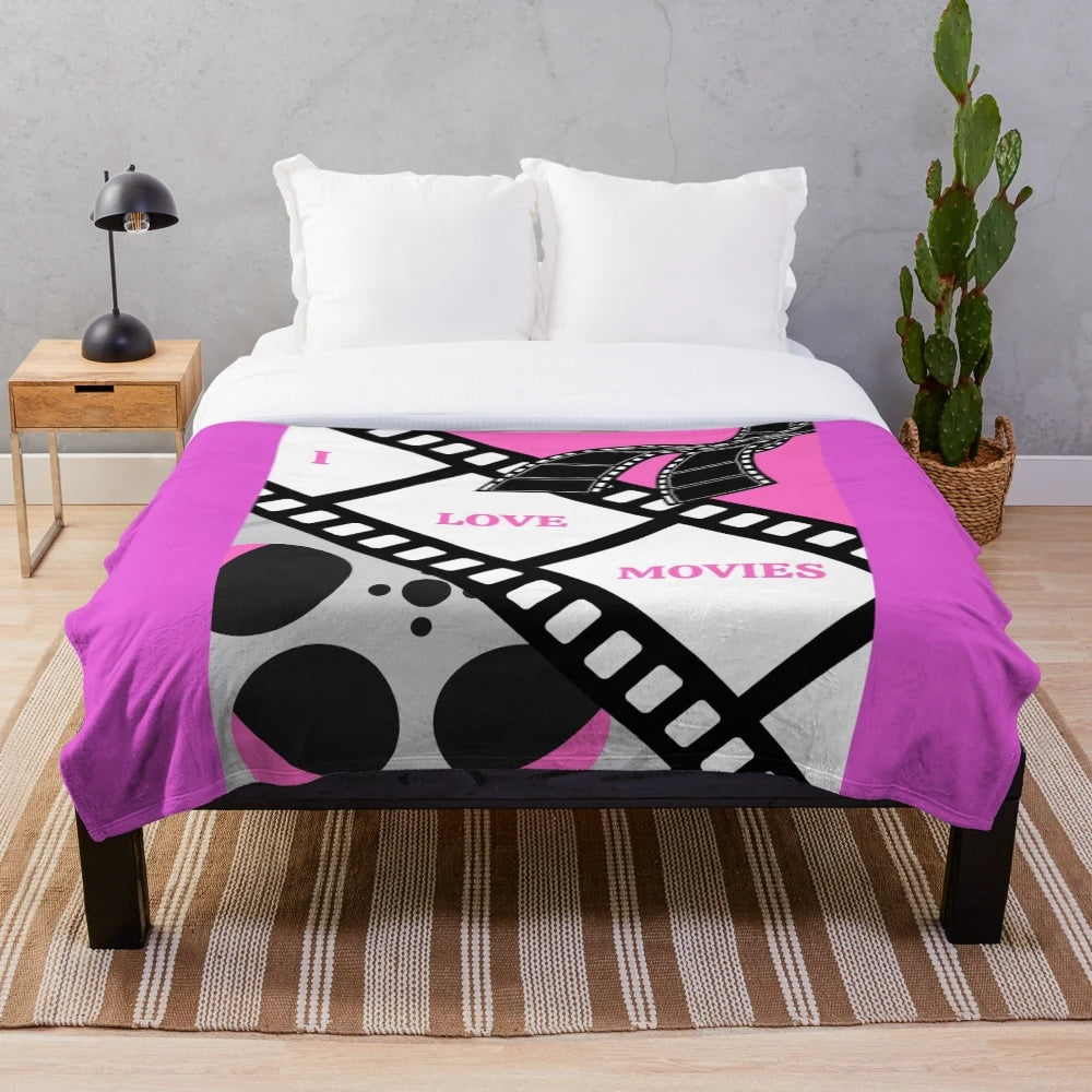 Cozy plush blanket for movie lovers featuring a "I LOVE MOVIES" design