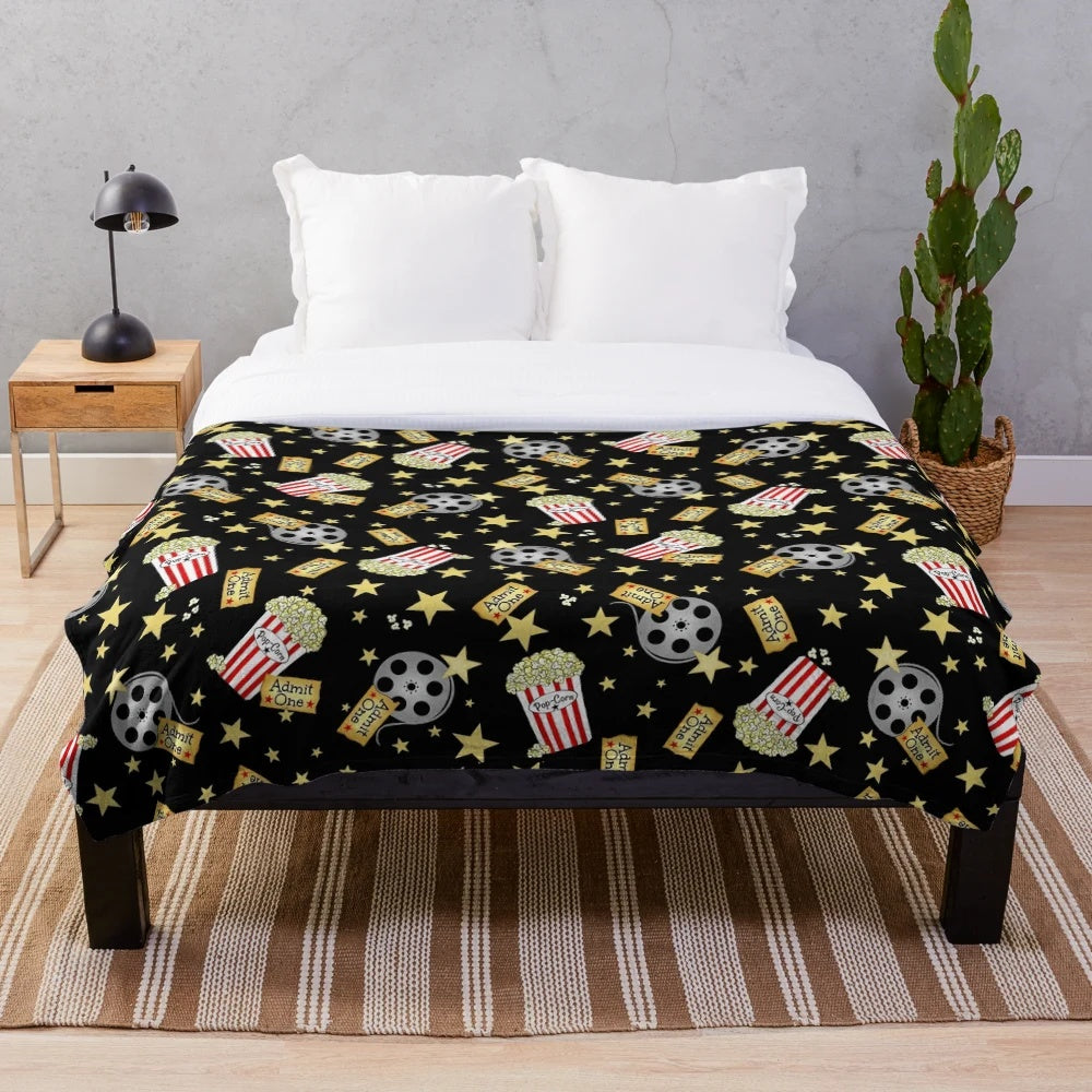 Soft and snuggly popcorn-themed plush blanket perfect for movie nights