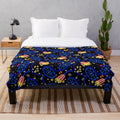 Plush blanket with a movie theater carpet pattern
