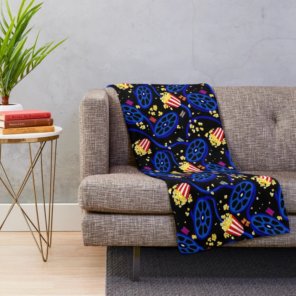 Plush blanket with a movie theater carpet pattern