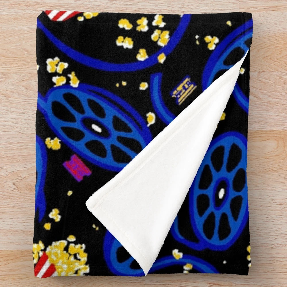 Plush blanket with a movie theater carpet pattern