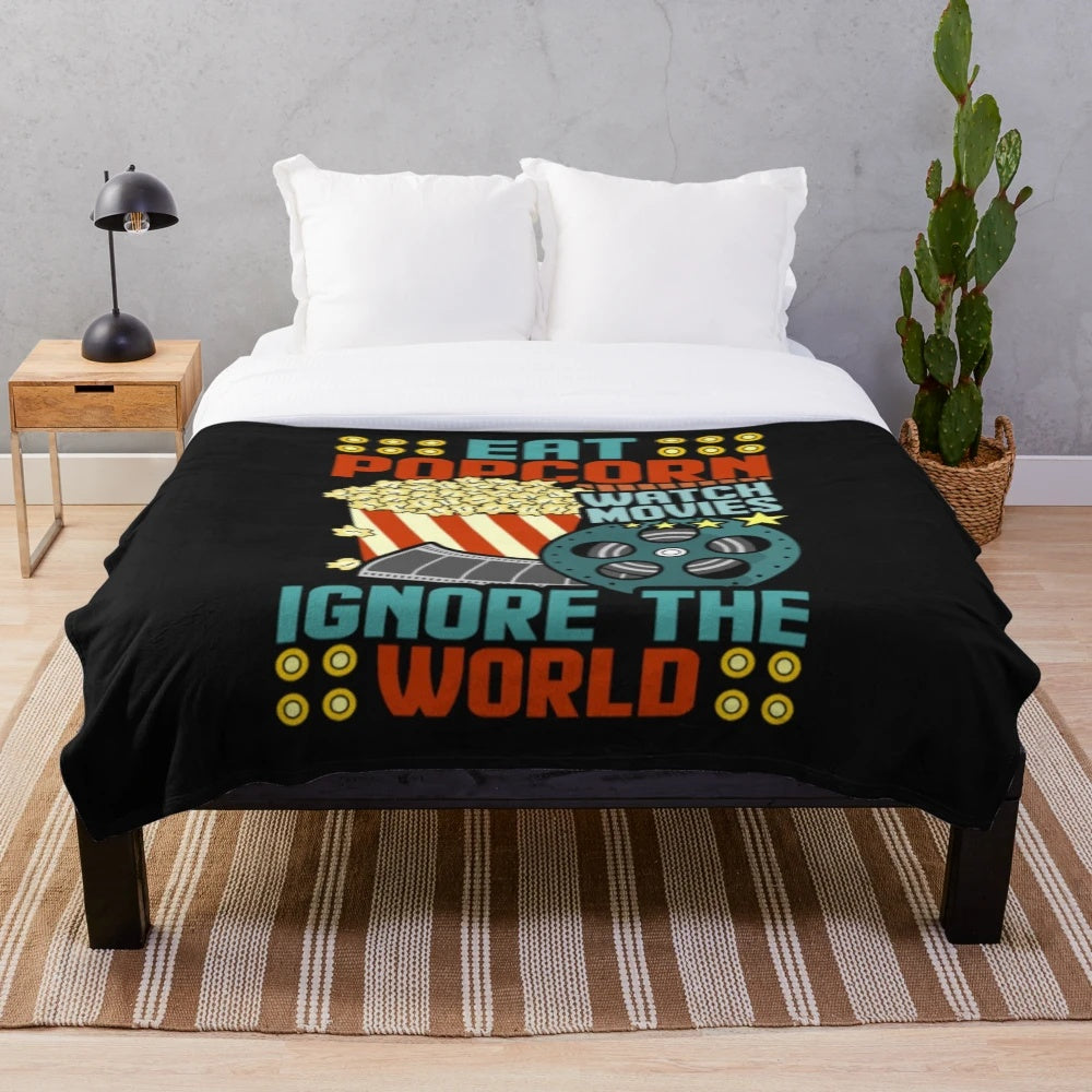 Soft and warm plush blanket with movie theater and popcorn design