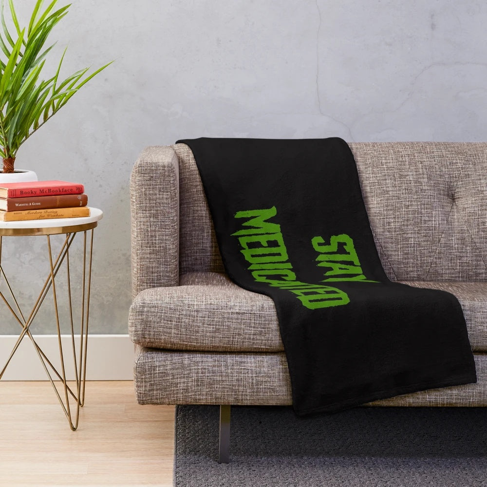 Plush blanket with a movie-themed design for medicated relaxation