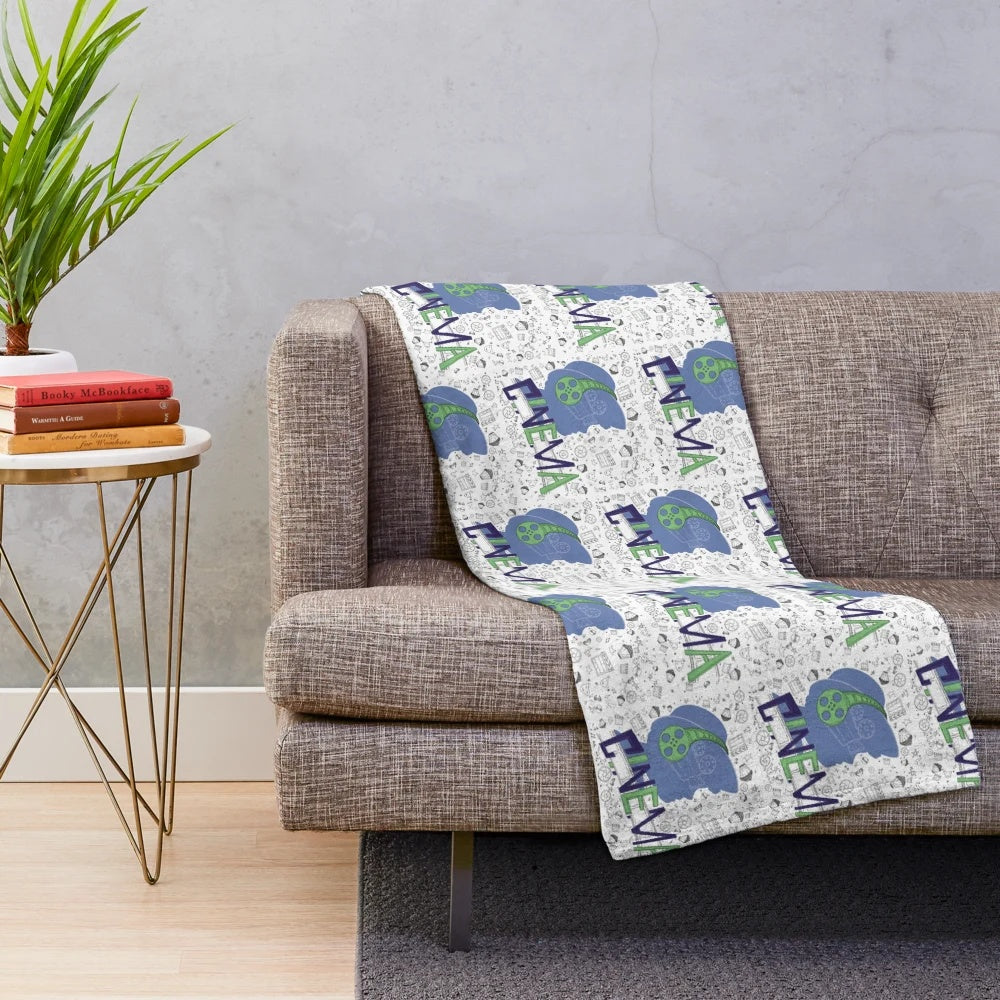 Cozy plush blanket featuring a seamless cinema pattern design