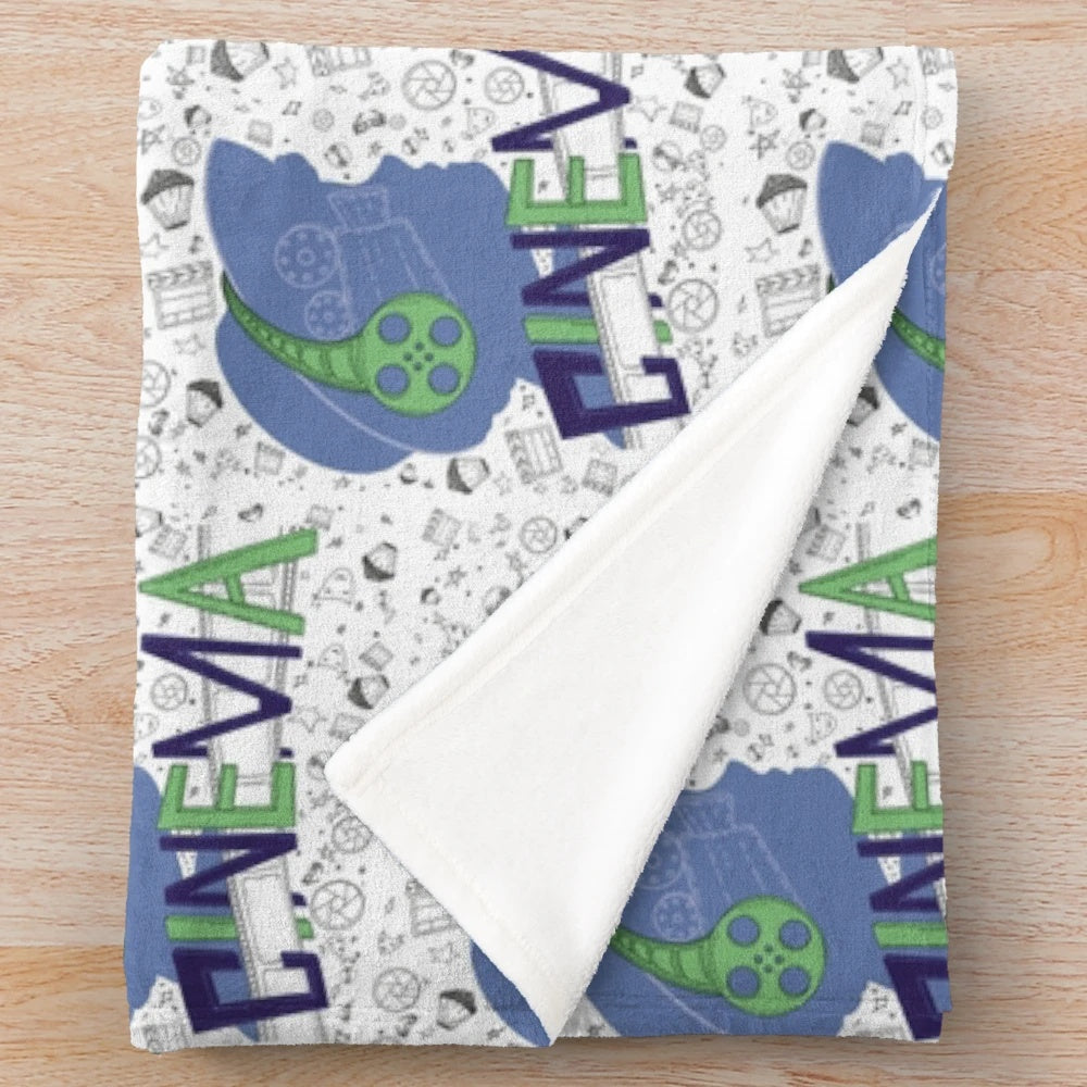Cozy plush blanket featuring a seamless cinema pattern design