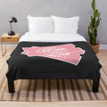 Plush blanket with movie ticket design, perfect for movie lovers