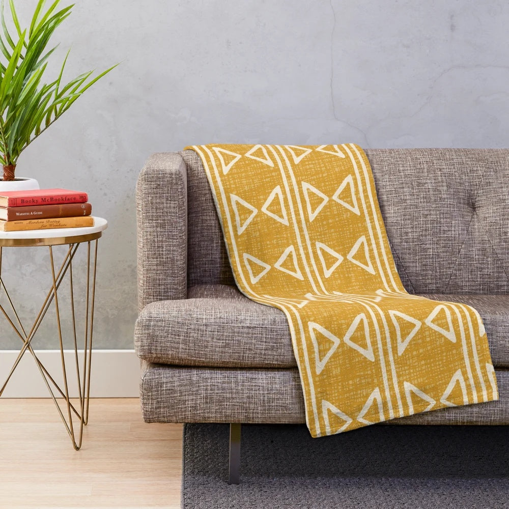 Mud cloth patterned plush blanket in earthy tones