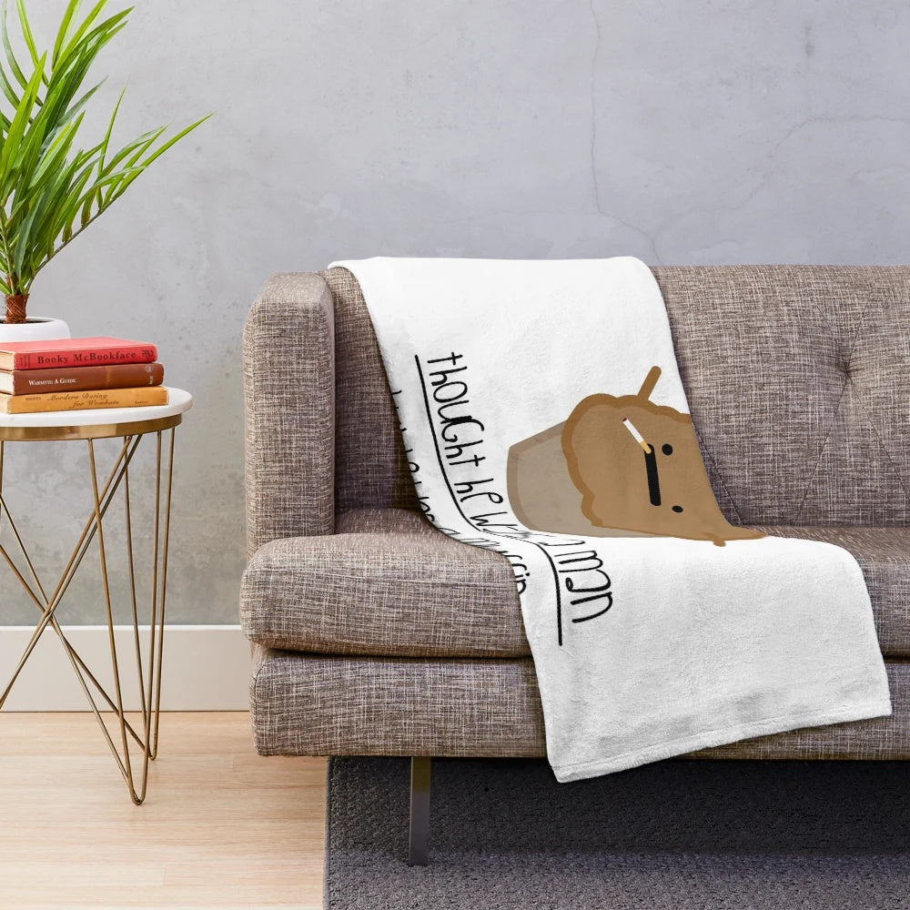 Soft and cuddly plush blanket featuring the muffin man character