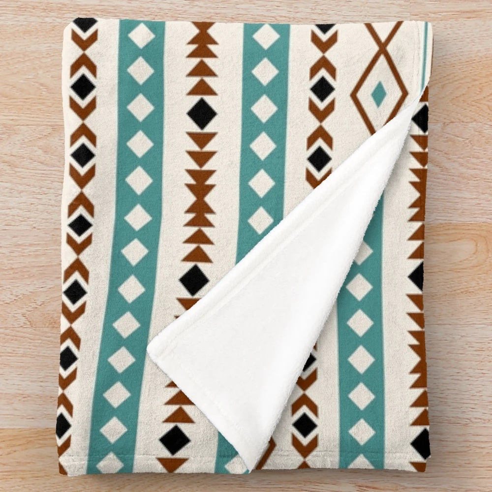 Multicolor patterned plush blanket with an Aztec-inspired tribal design