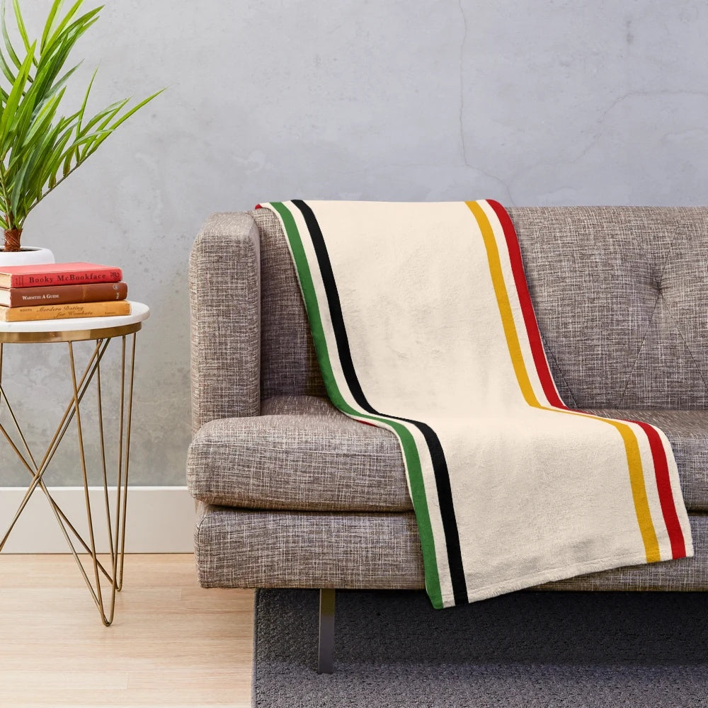Cozy multicolor plush blanket with Hudson Bay-inspired design
