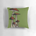Decorative pillow featuring a sketch-style illustration of a cluster of mushrooms in various shades of red, brown, and green.