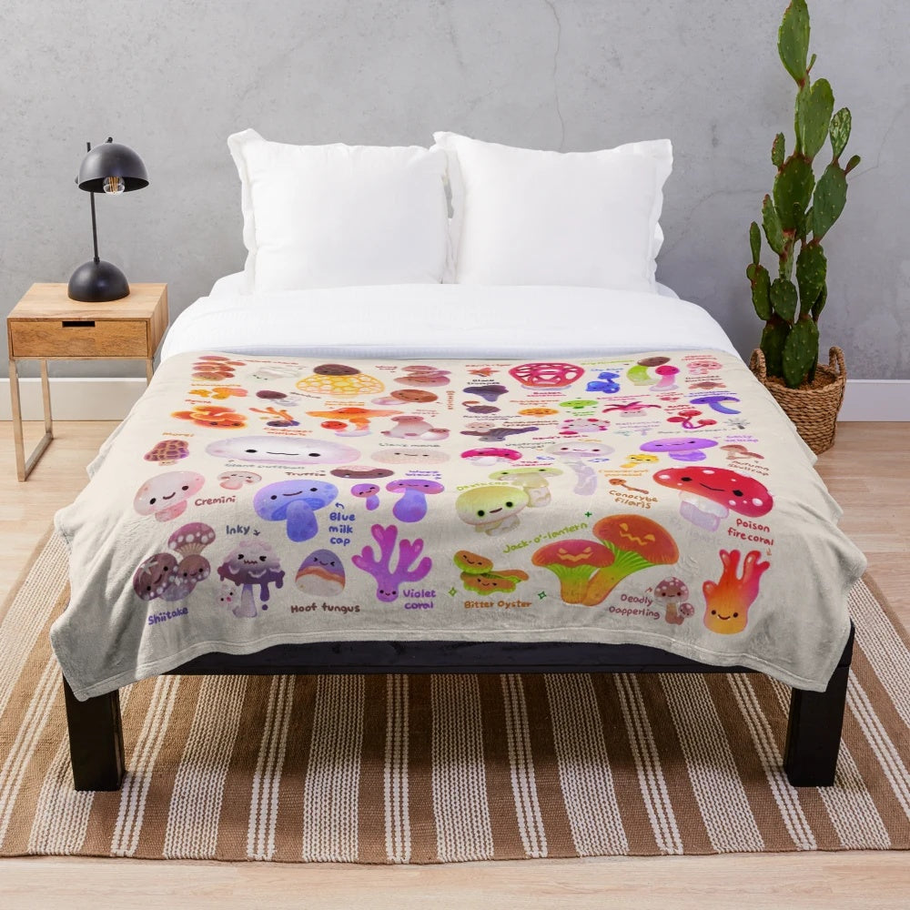 Closeup of a plush, soft, and fluffy mushroom-themed blanket in autumnal colors
