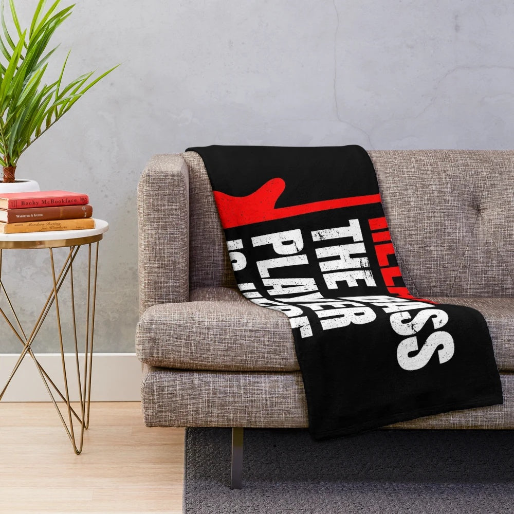 Soft plush blanket featuring a bass player design for music enthusiasts