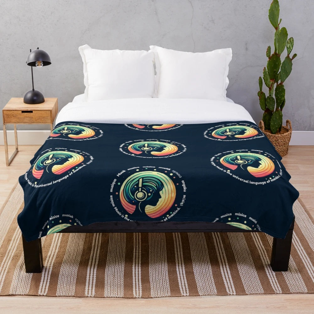A soft and plush music-themed blanket with a woman wearing headphones