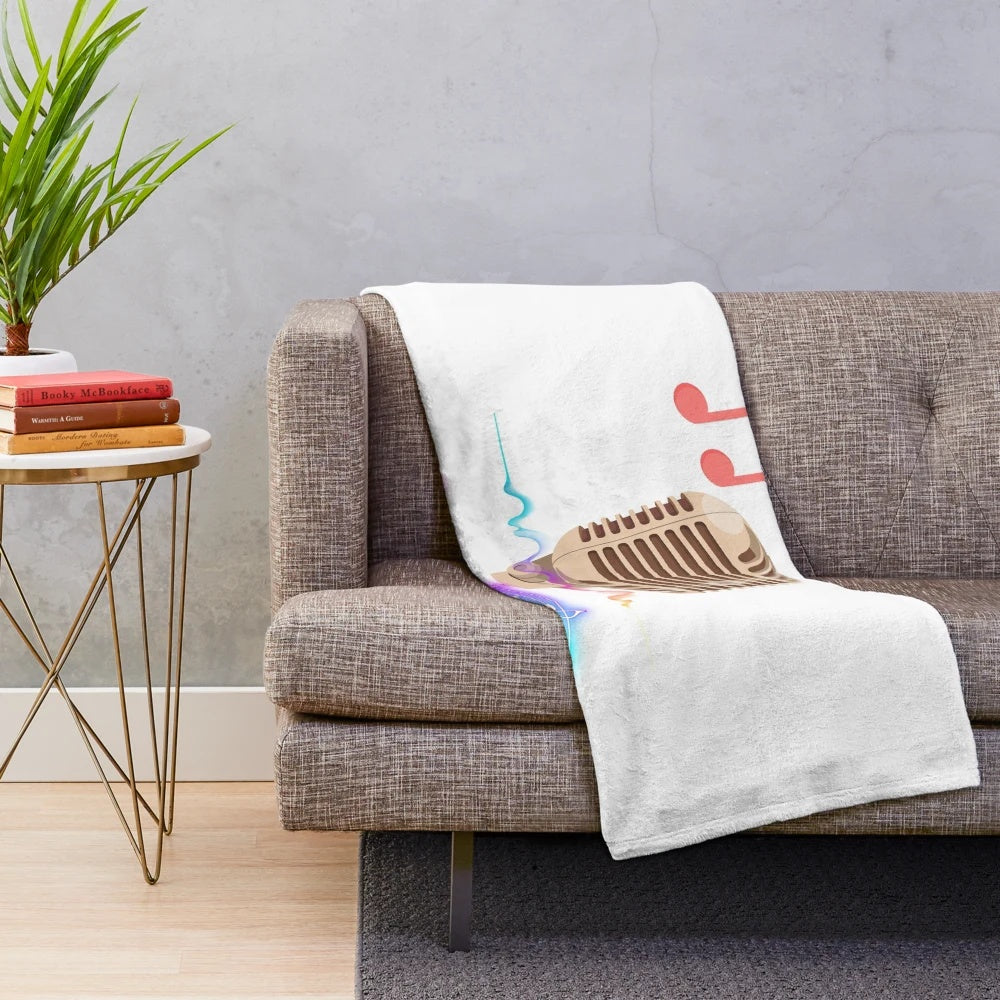 Colorful music-themed plush blanket with microphone and musical notes