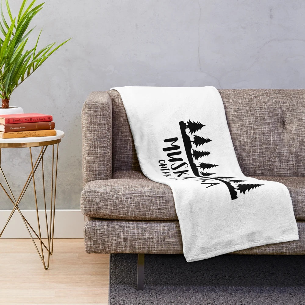 Muskoka-inspired plush blanket featuring Canadian landscape and nature