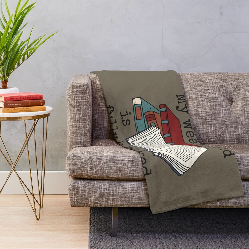 Cozy plush blanket featuring a literature pun design for book lovers