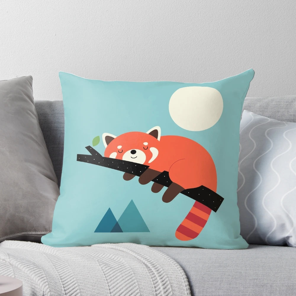 A soft, plush red panda pillow perfect for napping and relaxation