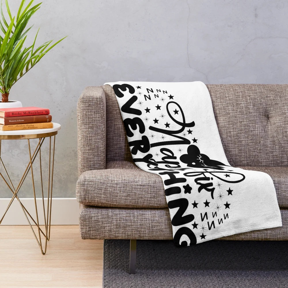 Plush nap blanket with "Naps Fix Everything" text