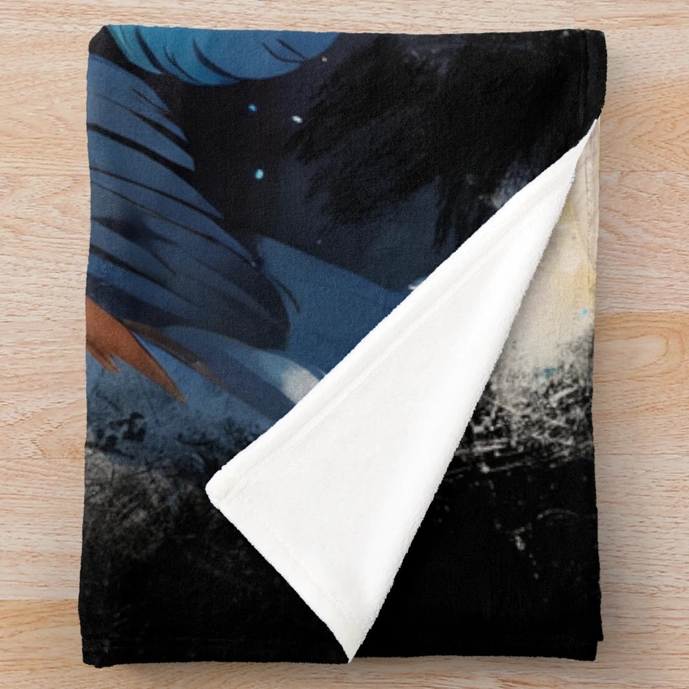 Native-inspired plush blanket with tribal patterns and feather designs