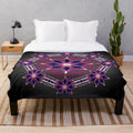 Native-inspired purple plush blanket with morning star and circle designs
