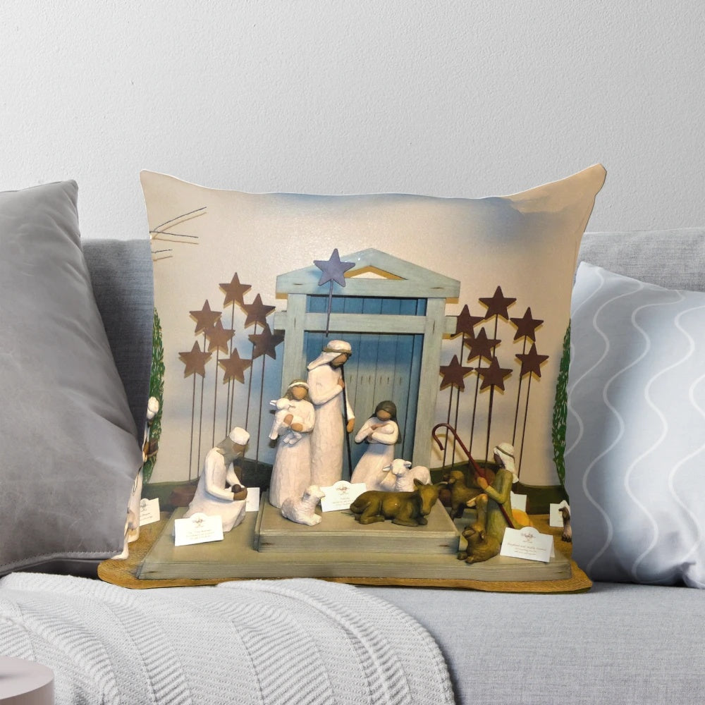 A beautiful nativity scene pillow featuring the holy family and baby Jesus.