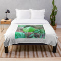 Natural leaf plush blanket with tropical and botanical design
