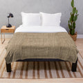 Cozy natural plush blanket in a burlap, hessian, and jute design