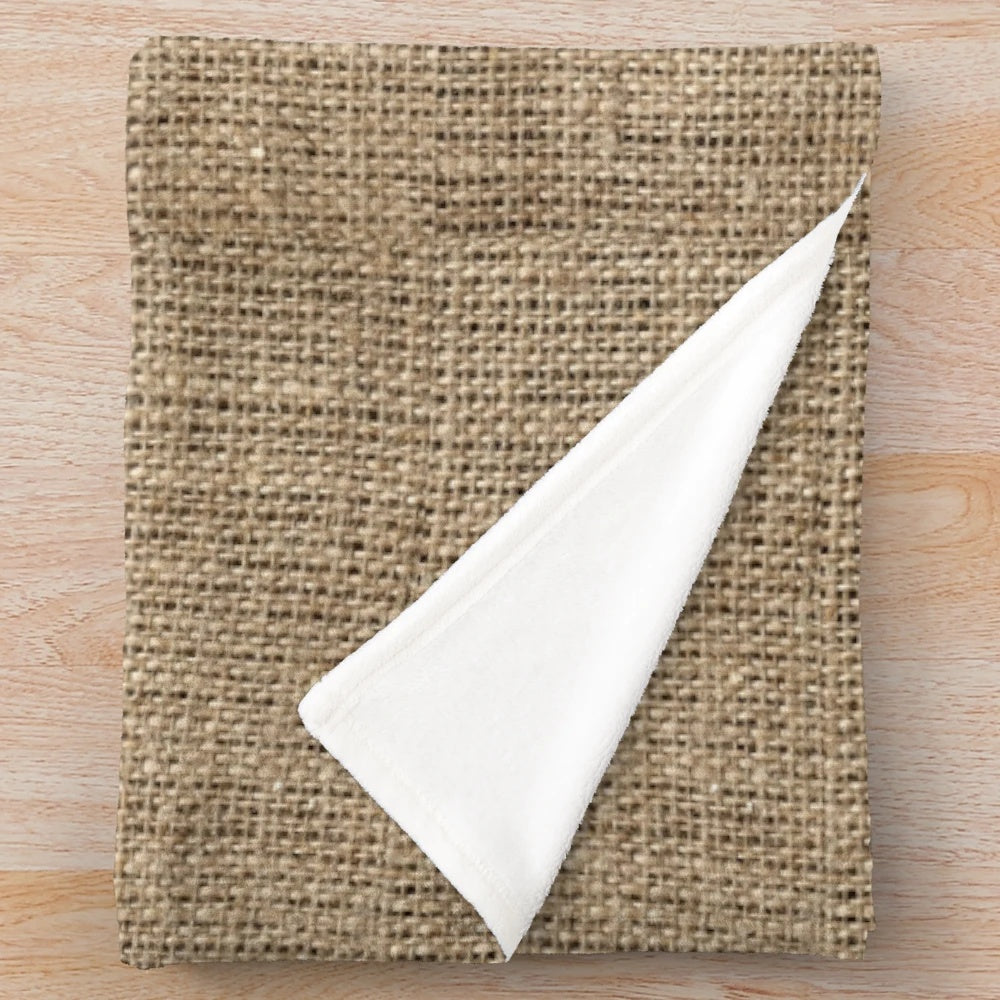 Cozy natural plush blanket in a burlap, hessian, and jute design
