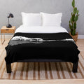 Plush blanket featuring a nature-inspired guitar silhouette design