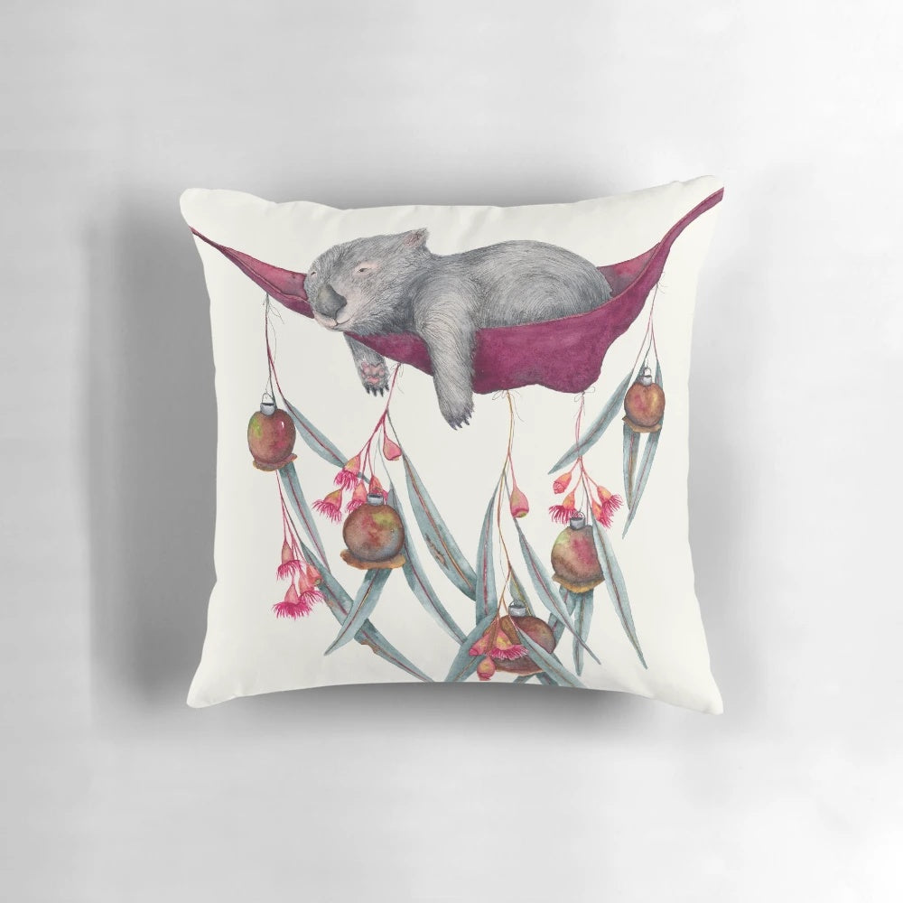A cozy, nature-inspired pillow with eucalyptus leaves and flowers, perfect for relaxation.